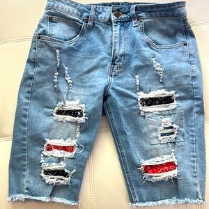 Jean shorts with black and red bandanna holes